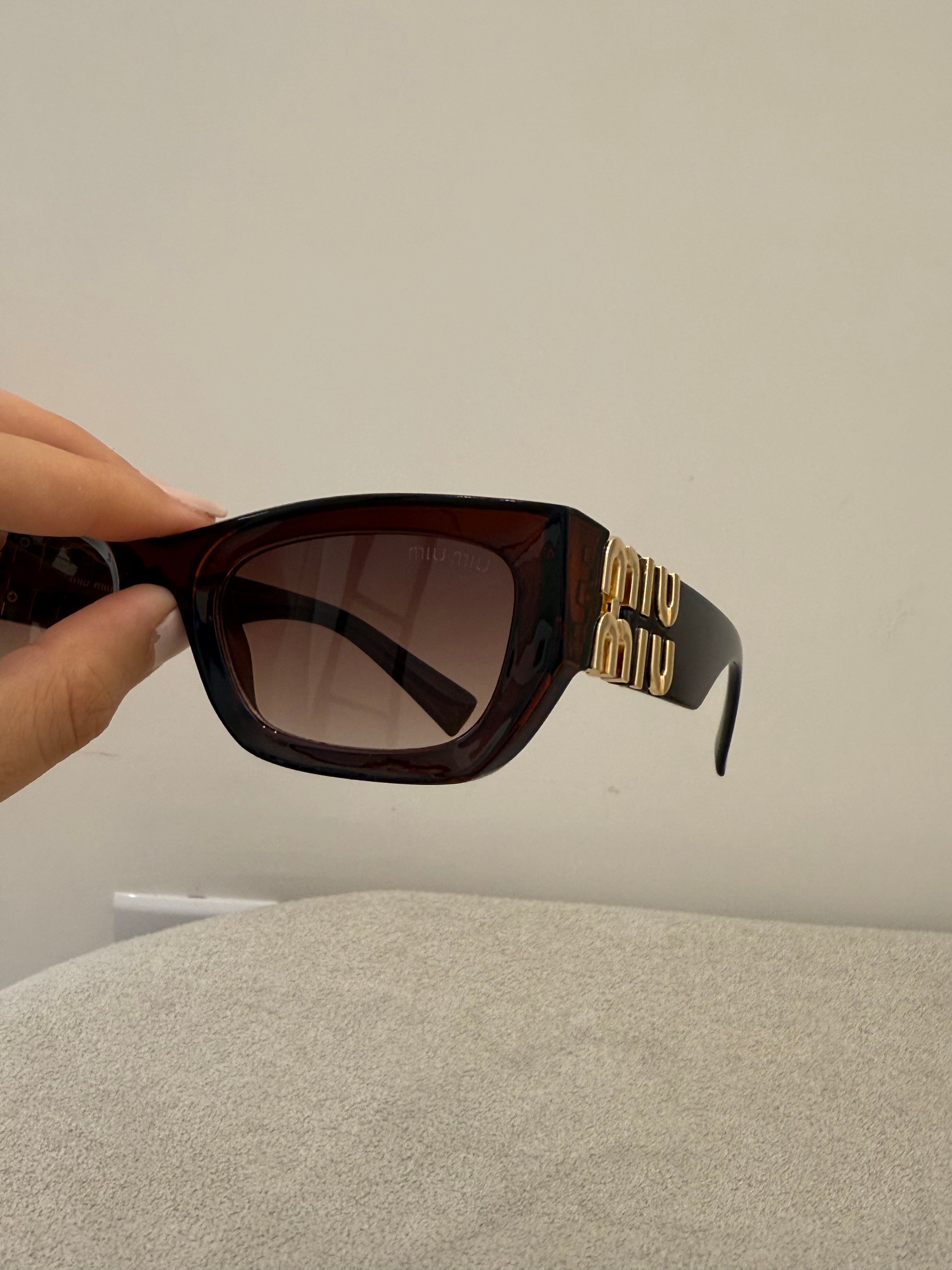Óculos Miu Miu 3