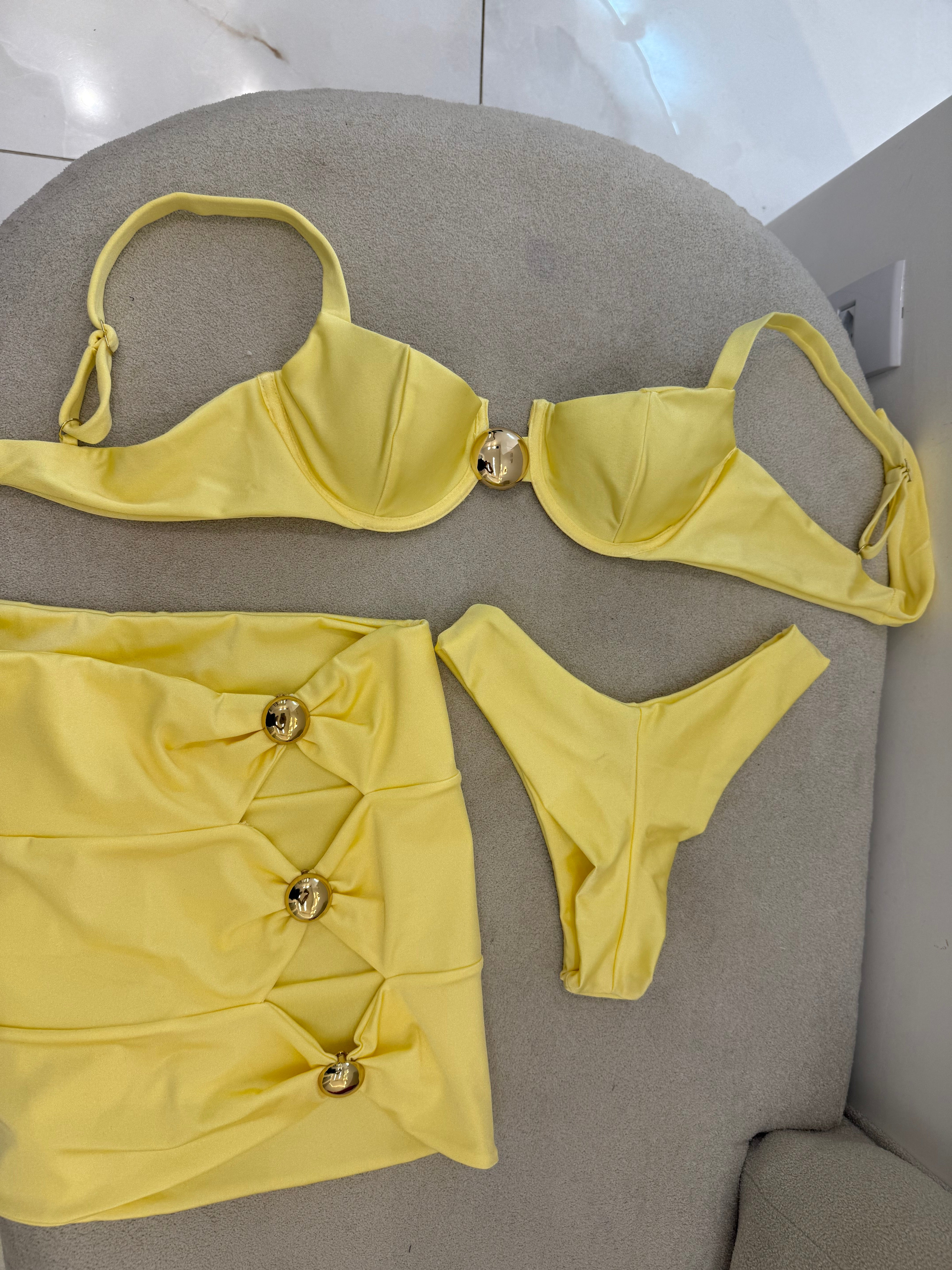 Botão Asa Delta Aro Amarelo