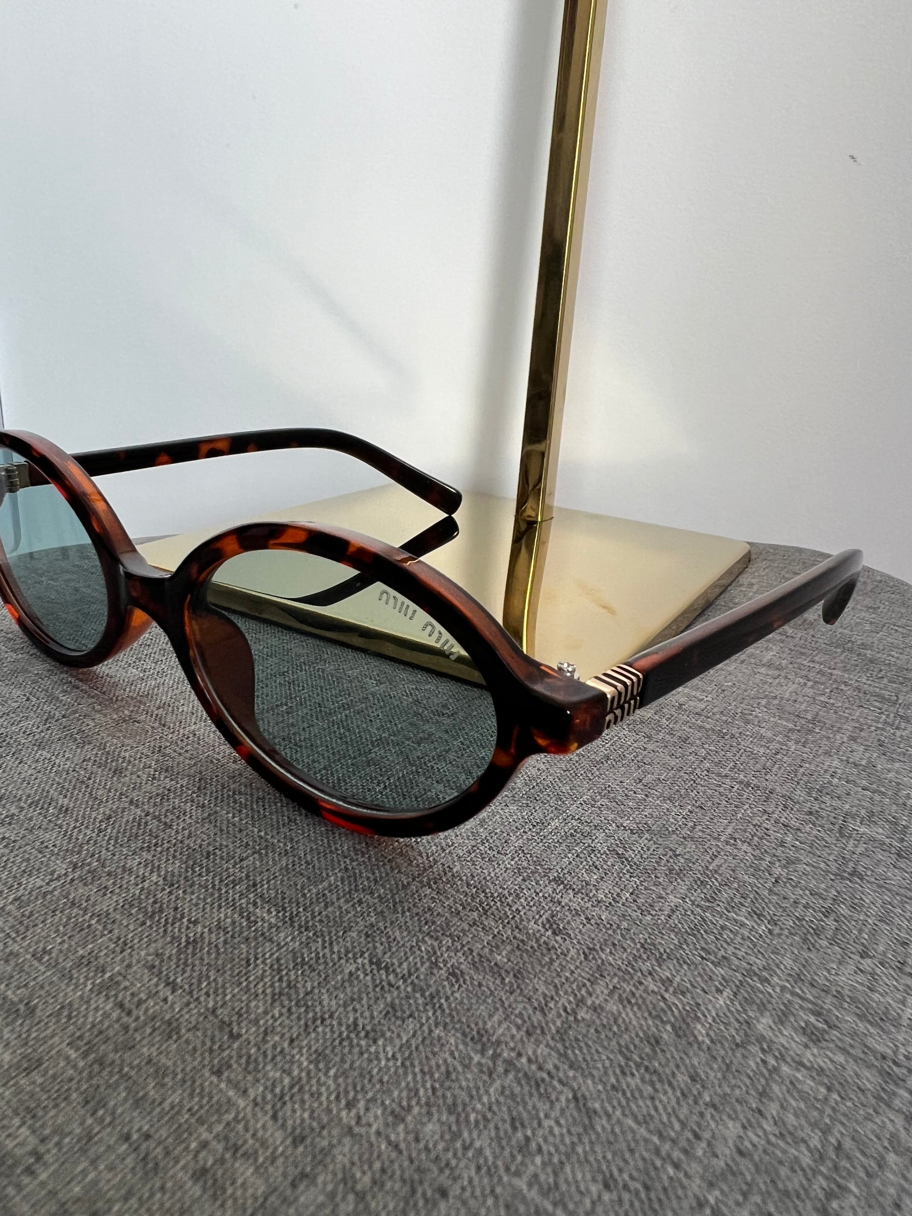 Óculos Miu Miu 6