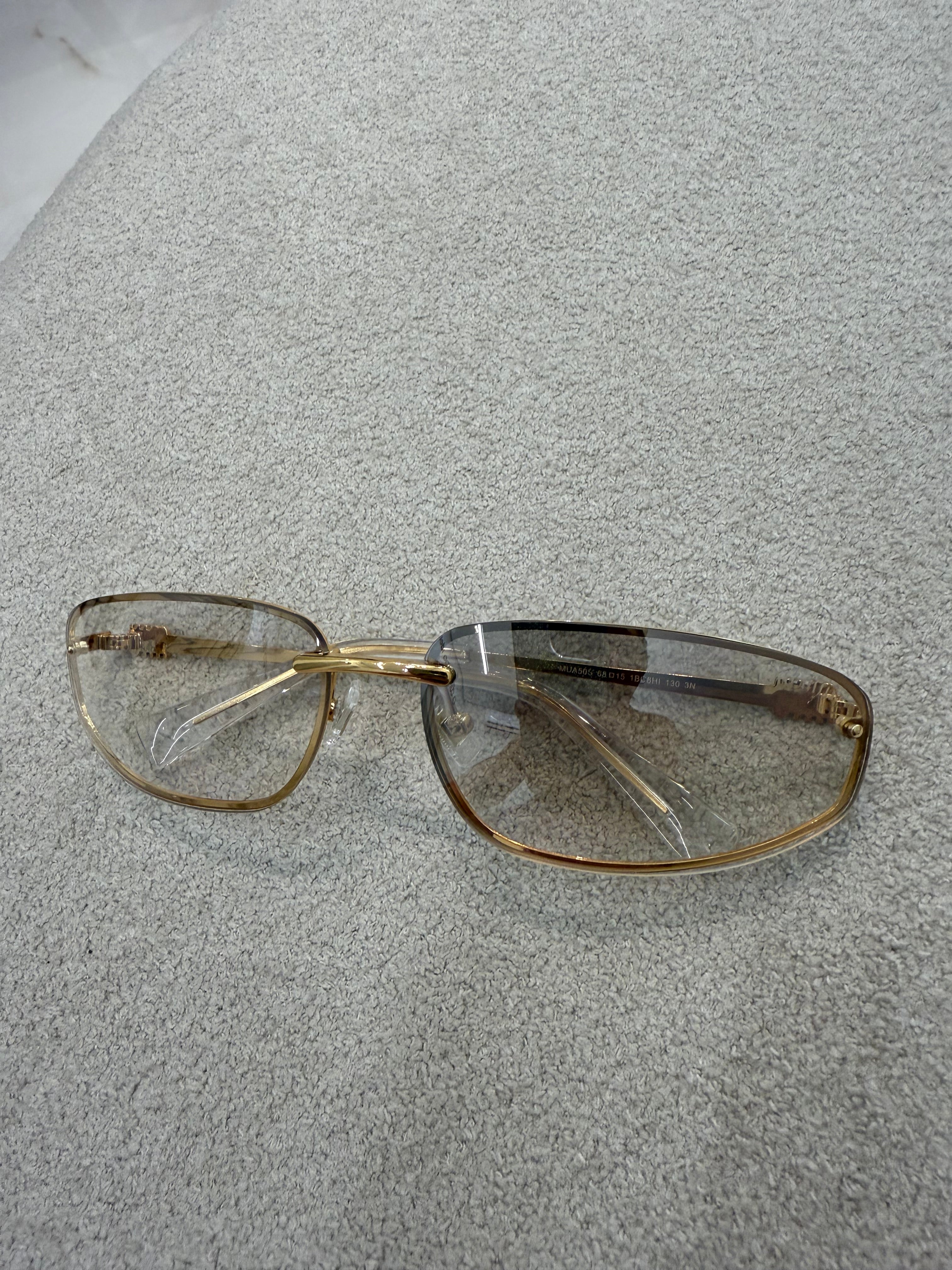 Óculos Miu Miu 043