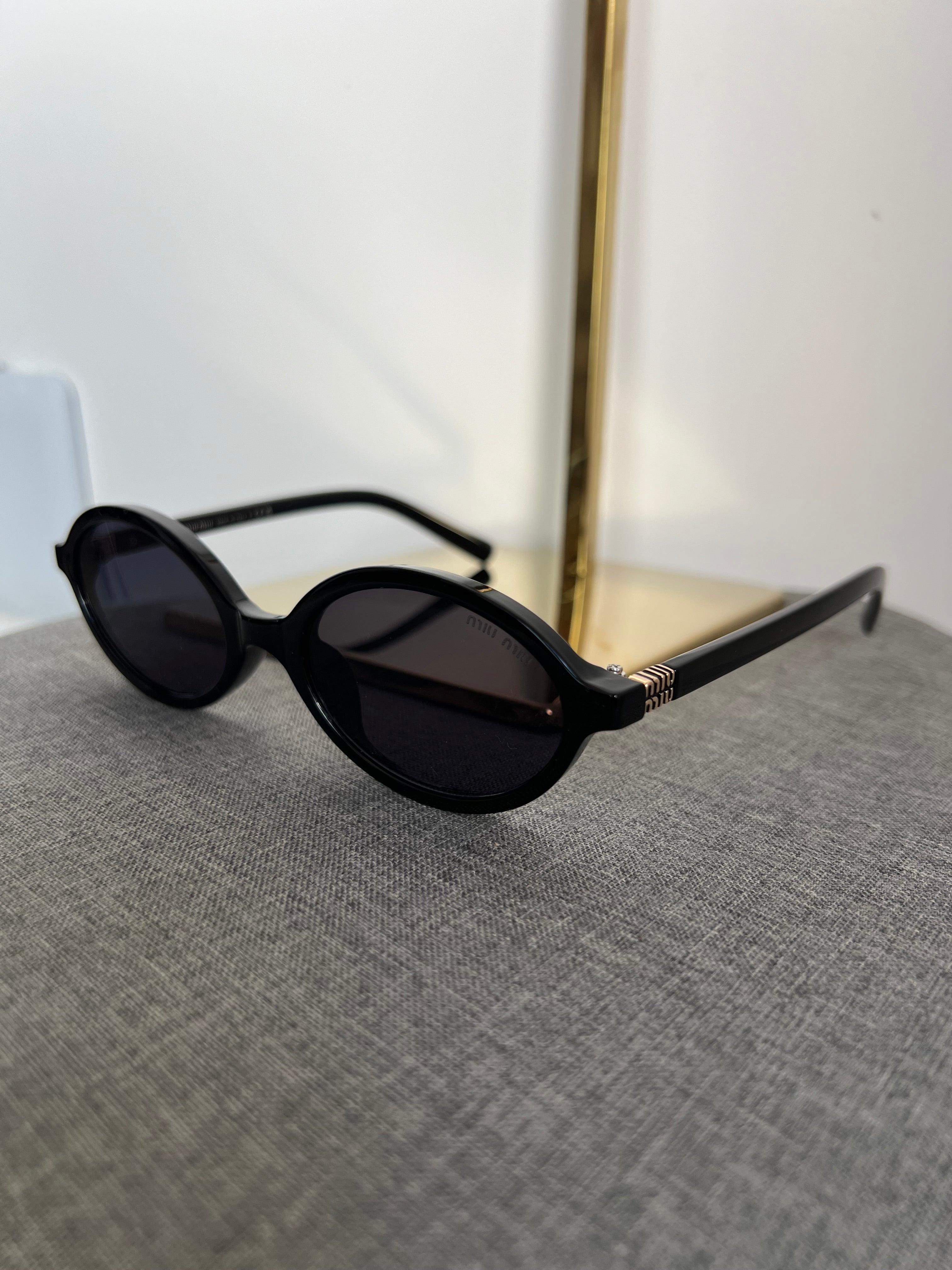 Óculos Miu Miu 6