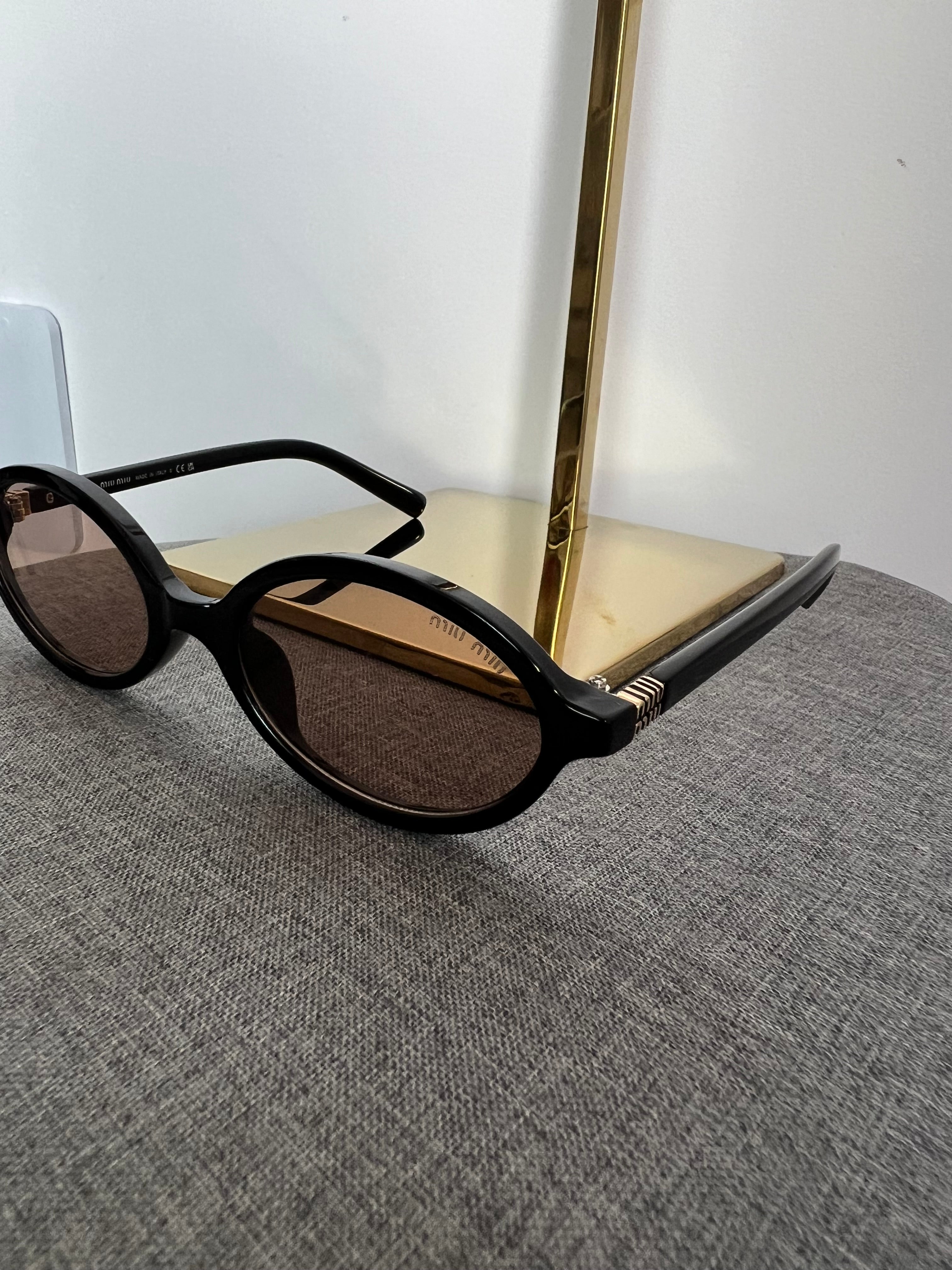 Óculos Miu Miu 6