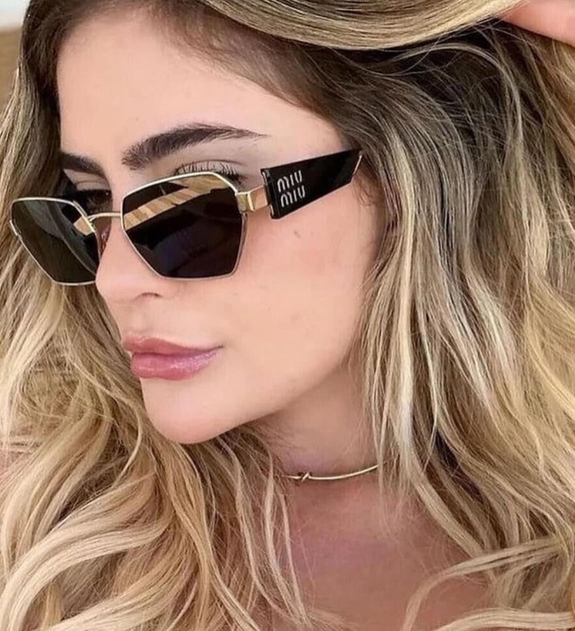 Óculos Miu Miu 4