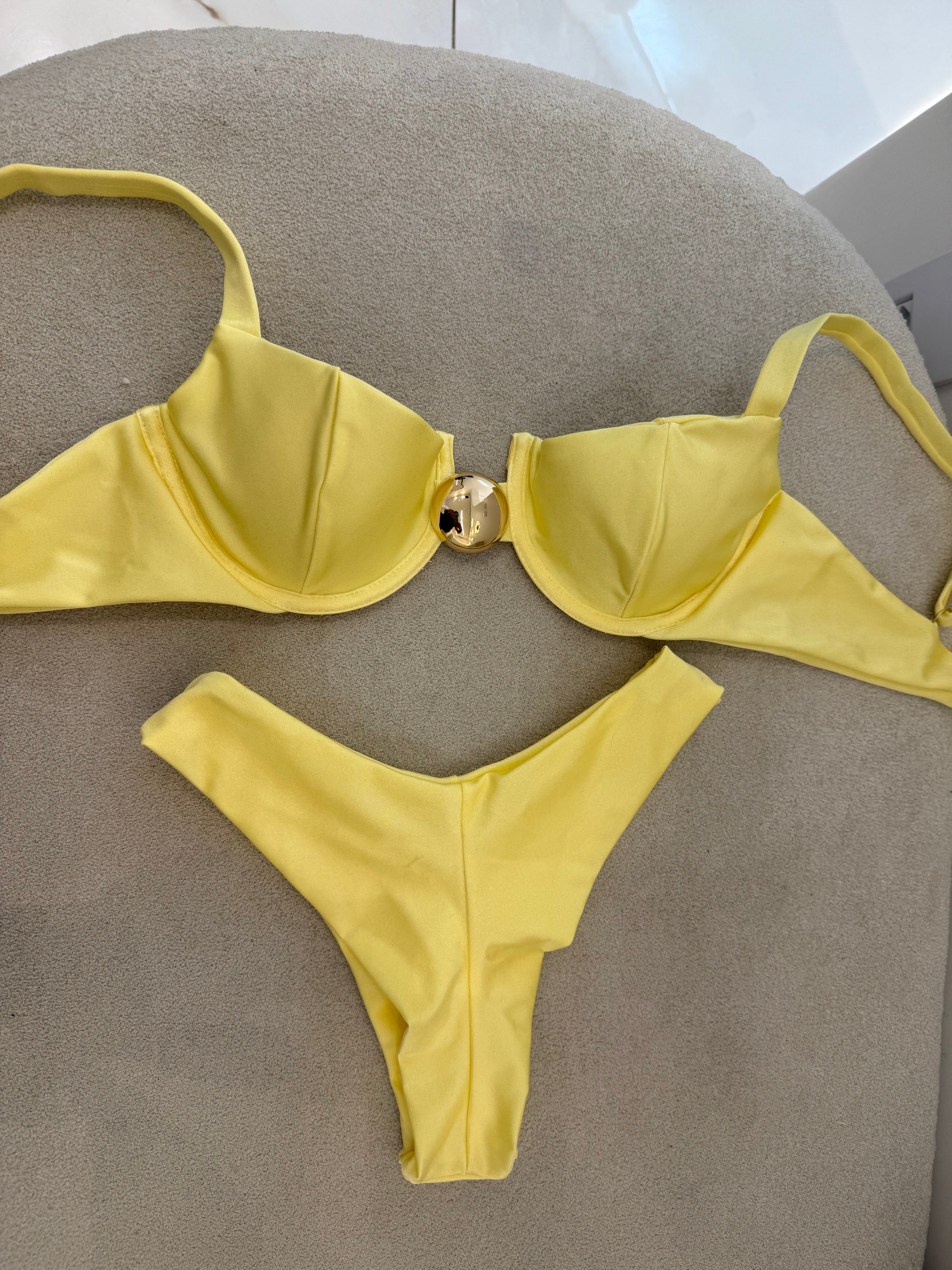 Botão Asa Delta Aro Amarelo