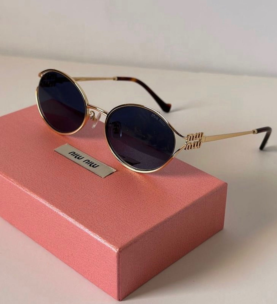 Óculos Miu Miu 5