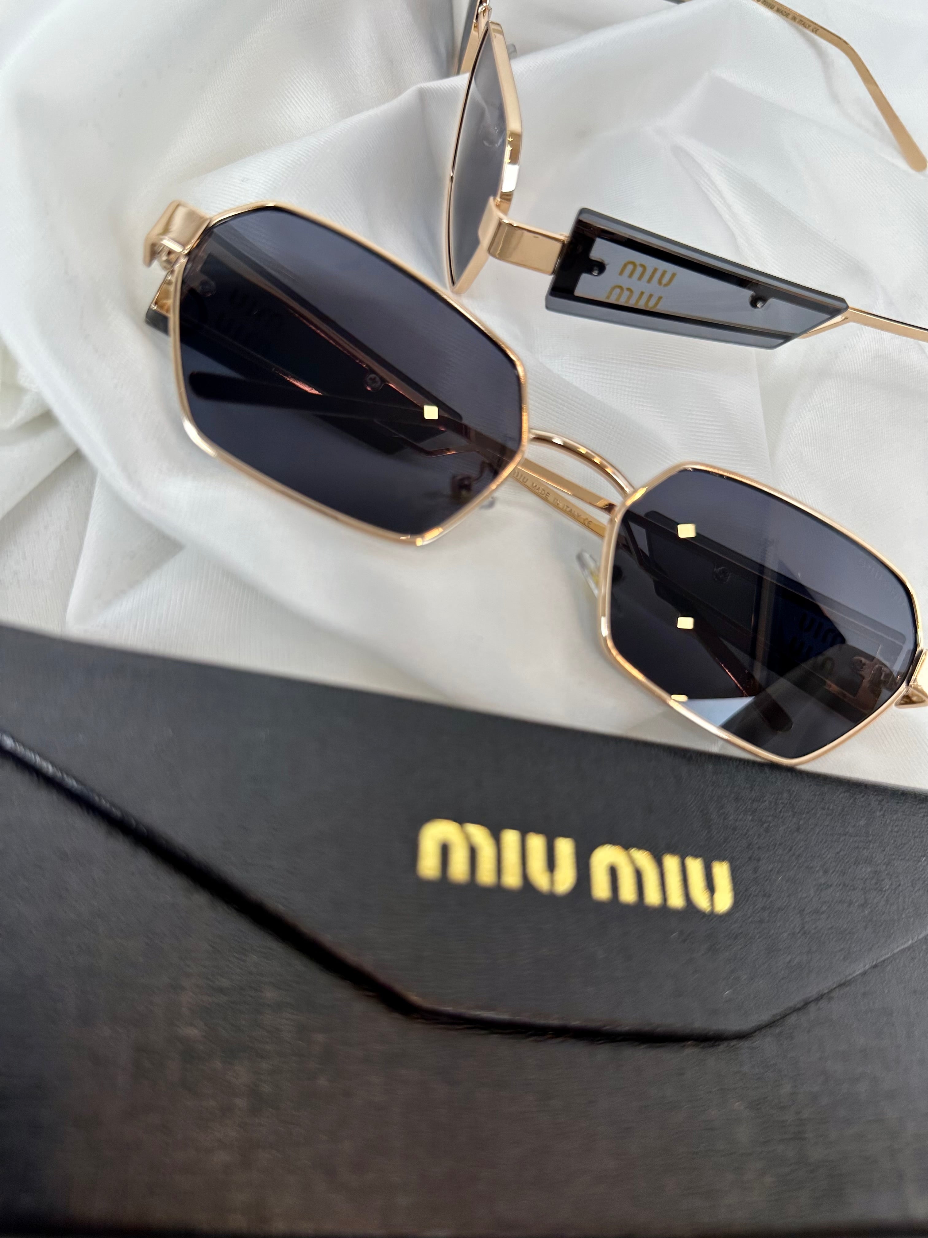 Óculos Miu Miu 4