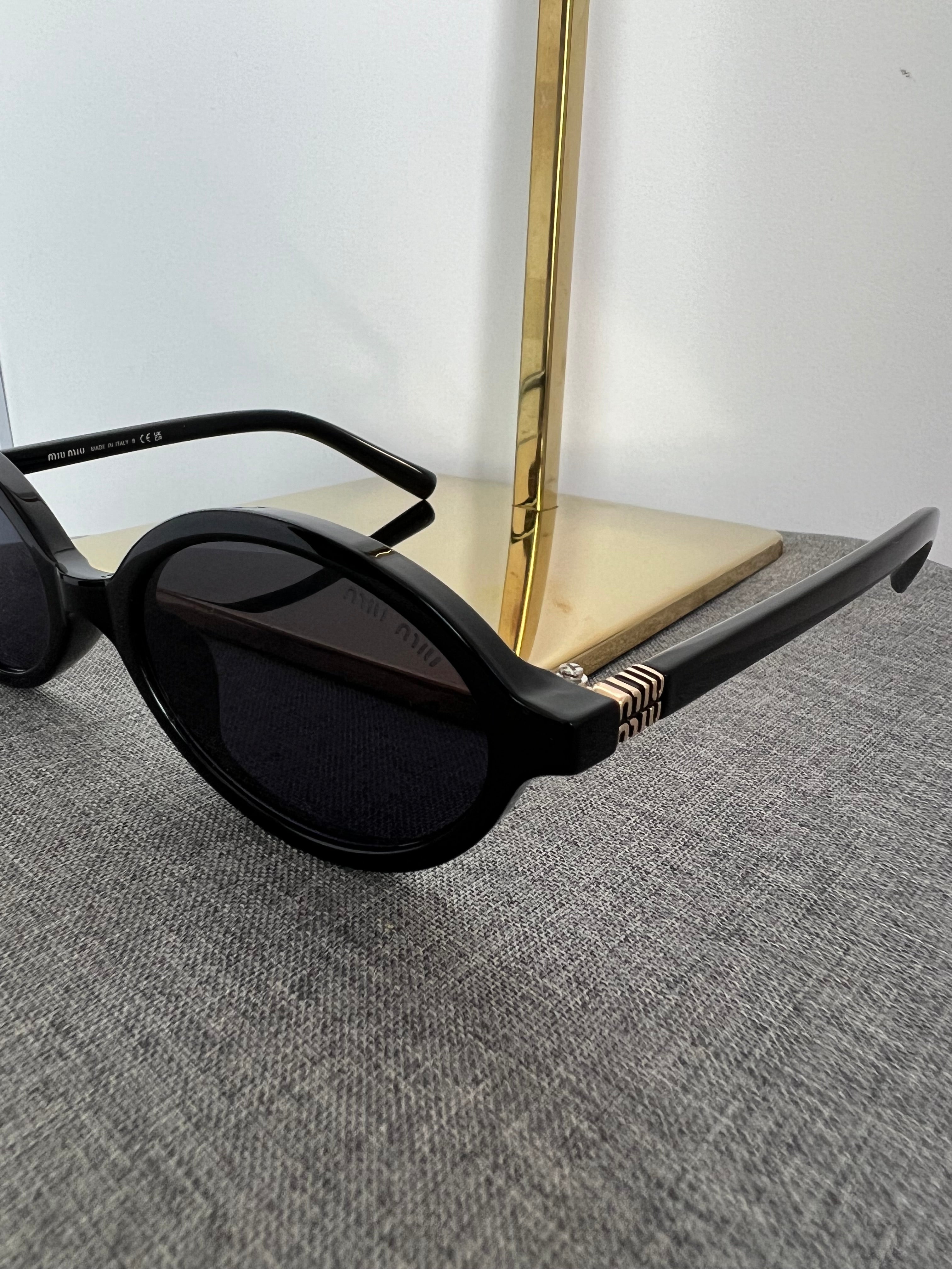 Óculos Miu Miu 6