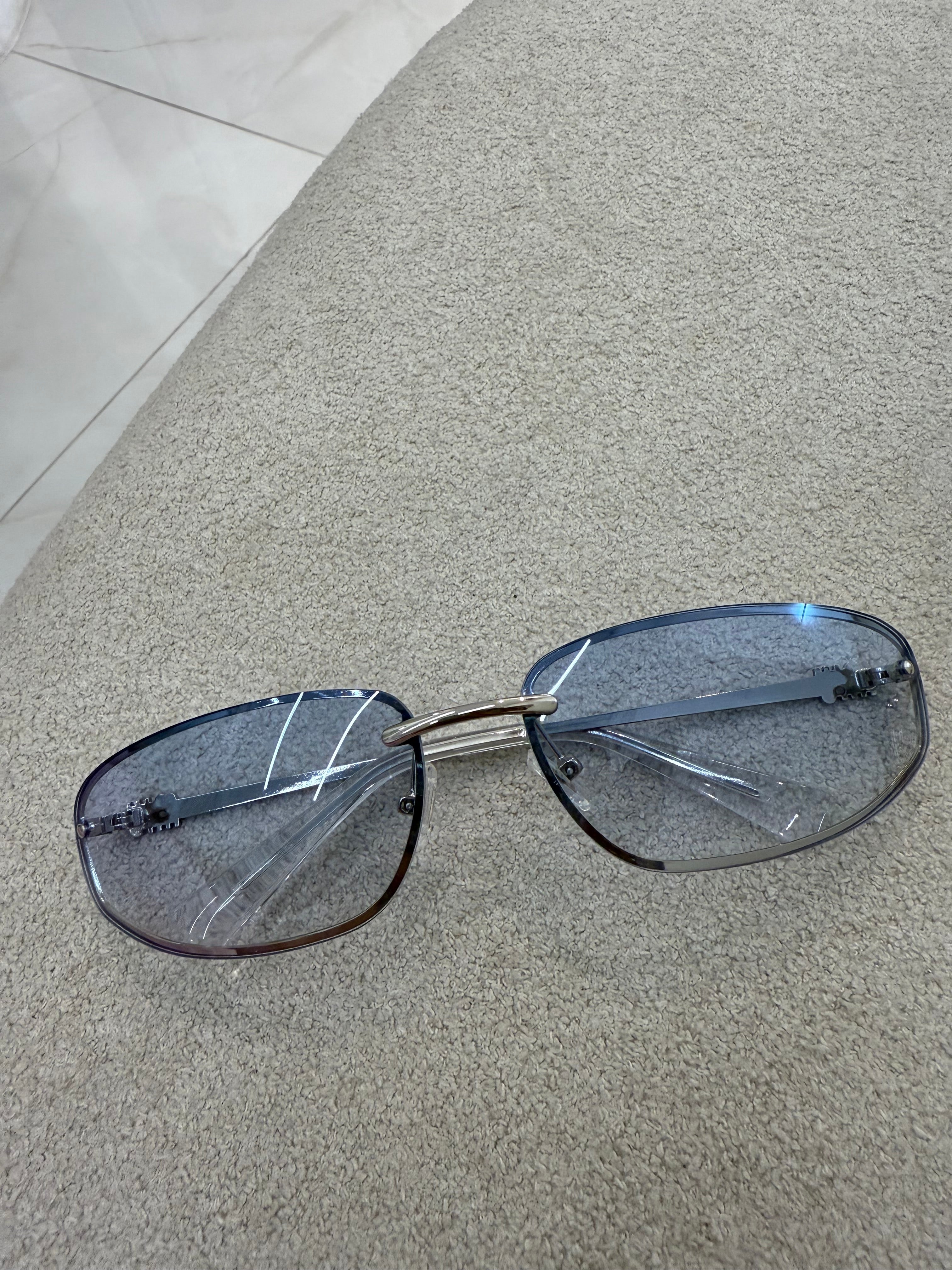 Óculos Miu Miu 043