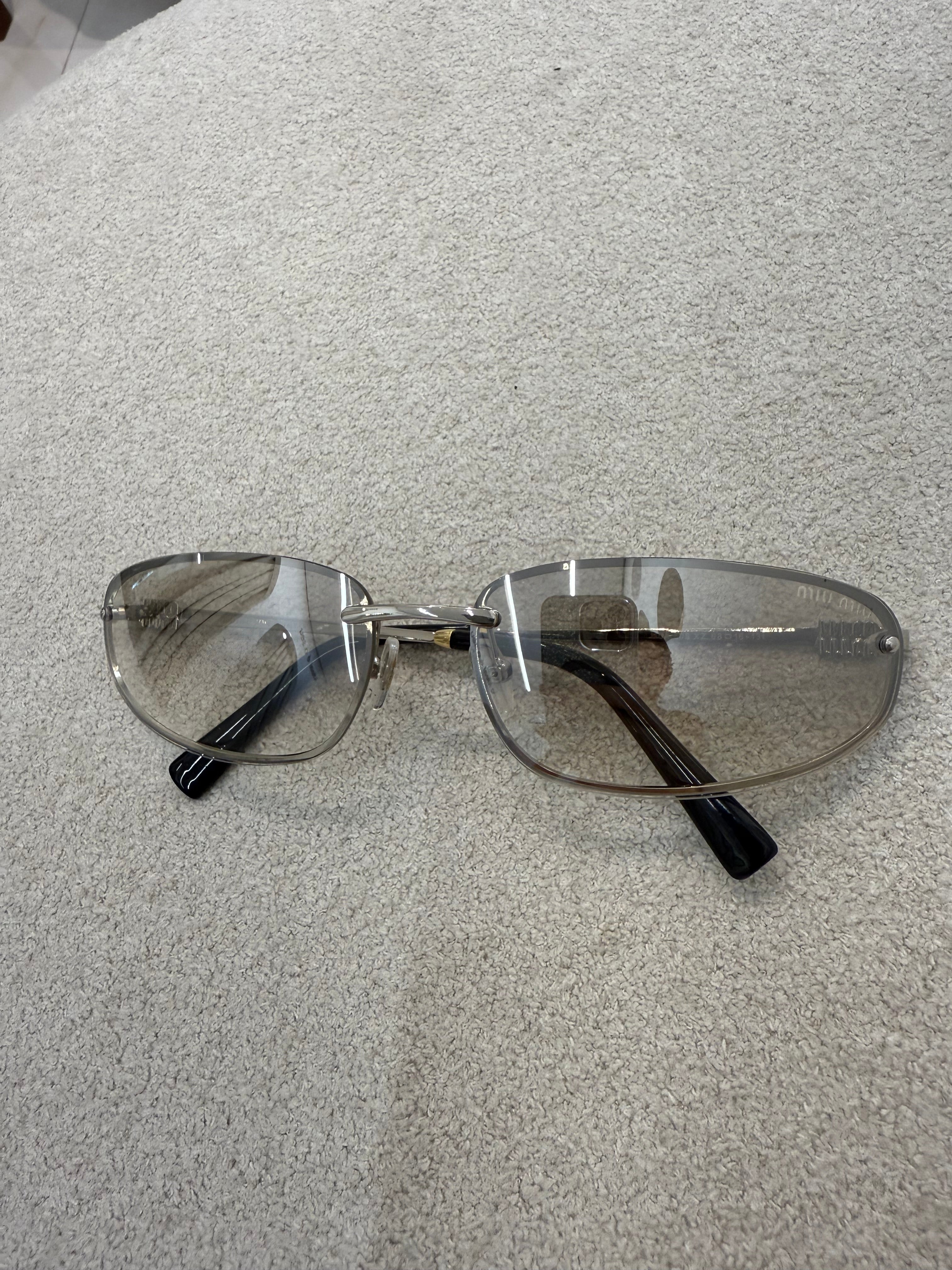 Óculos Miu Miu 043