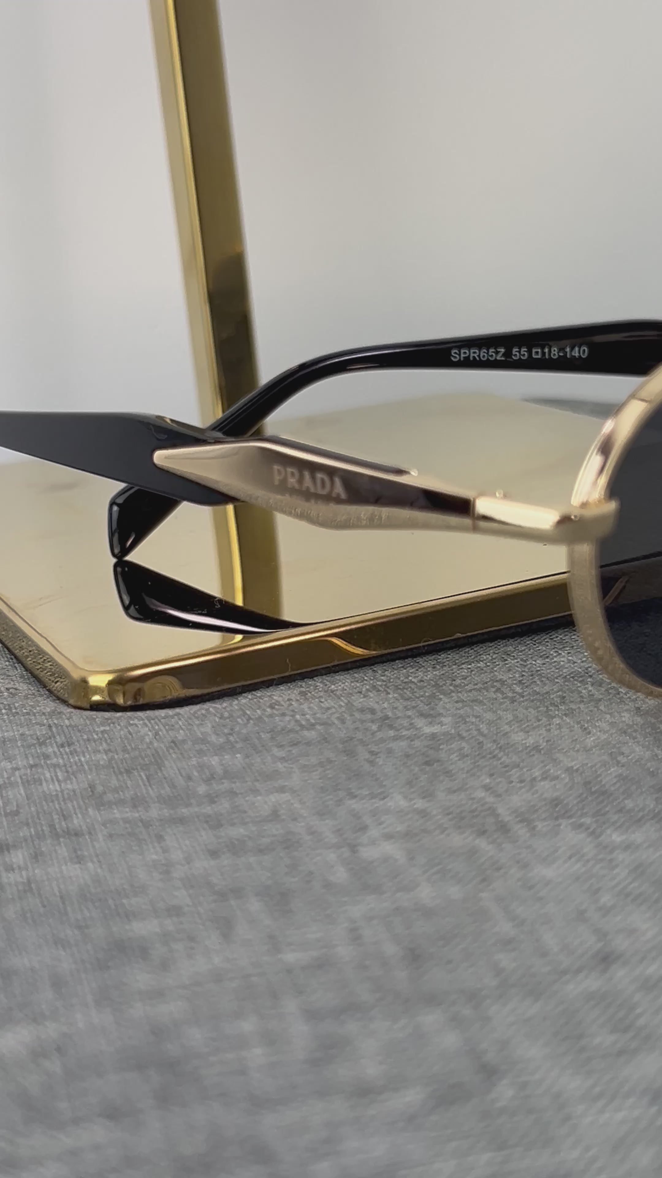 Óculos Prada
